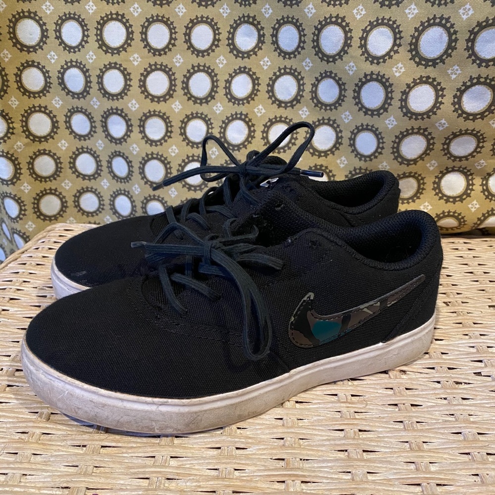 Nike SB shoes. Size 2Y. Black and camouflage.